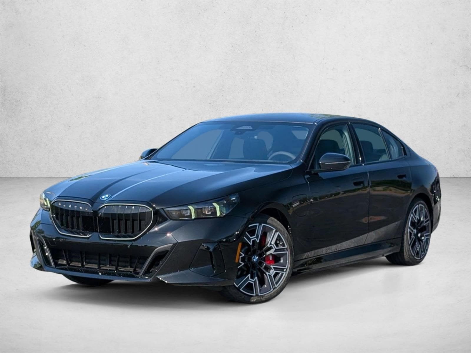 2026 BMW 5 Series 550e xDrive Sedan's photo