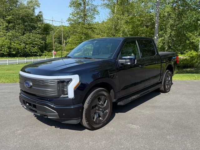 Used 2023 Ford F-150 Lightning Lariat with VIN 1FT6W1EV6PWG00032 for sale in Mystic, CT