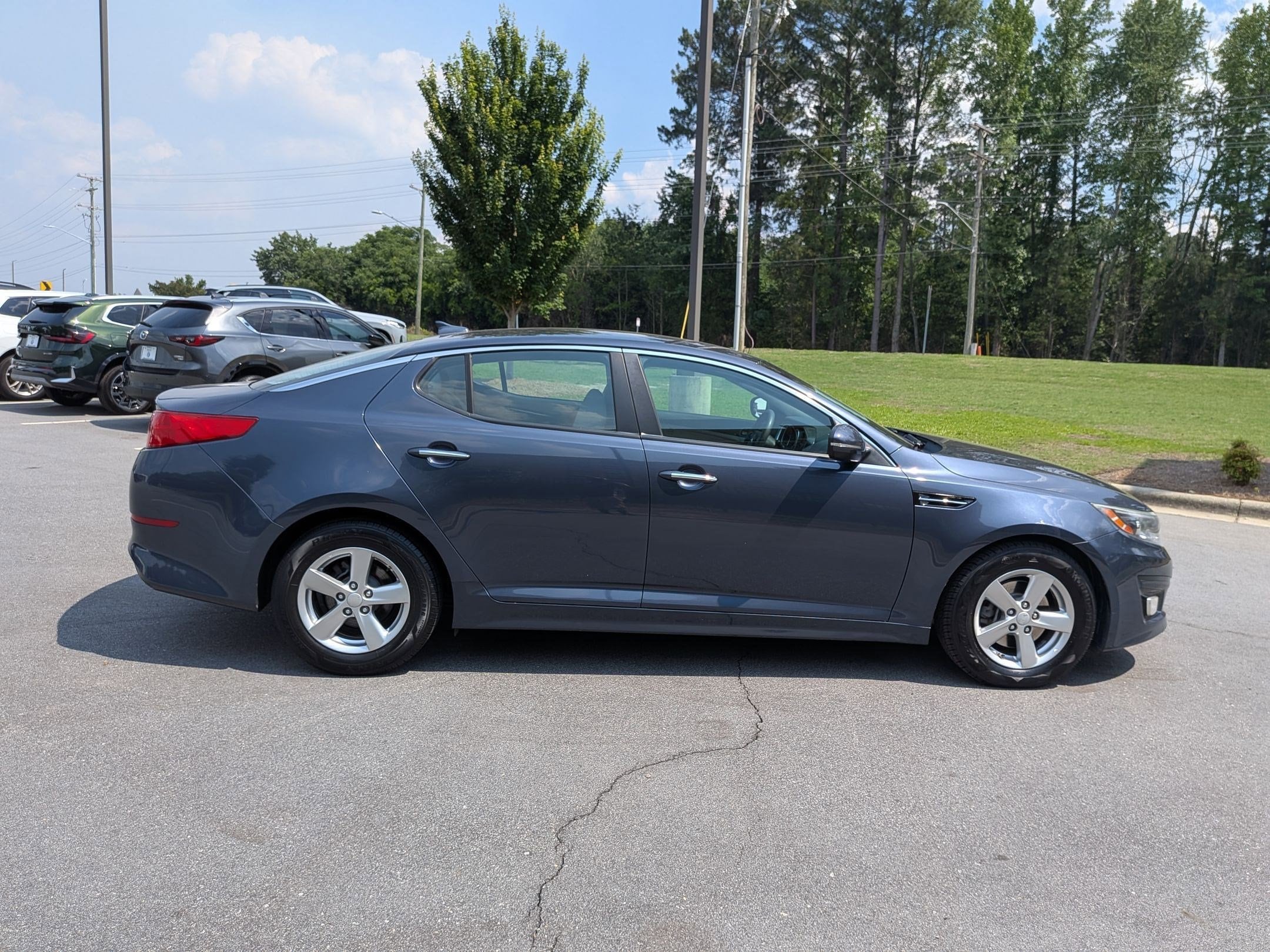 Used 2015 Kia Optima LX with VIN 5XXGM4A76FG483135 for sale in Fayetteville, NC