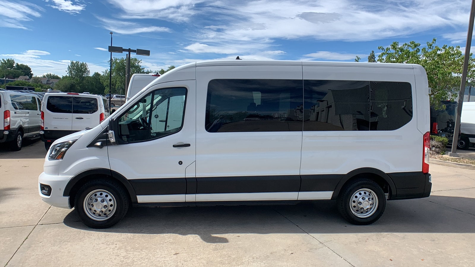 Used 2023 Ford Transit Passenger Van XLT with VIN 1FBAX9CG4PKA94397 for sale in Boulder, CO