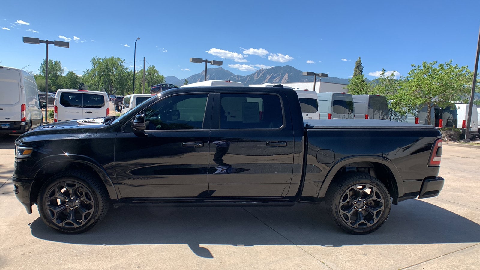 Used 2021 RAM Ram 1500 Pickup Limited with VIN 1C6SRFHT8MN811884 for sale in Boulder, CO