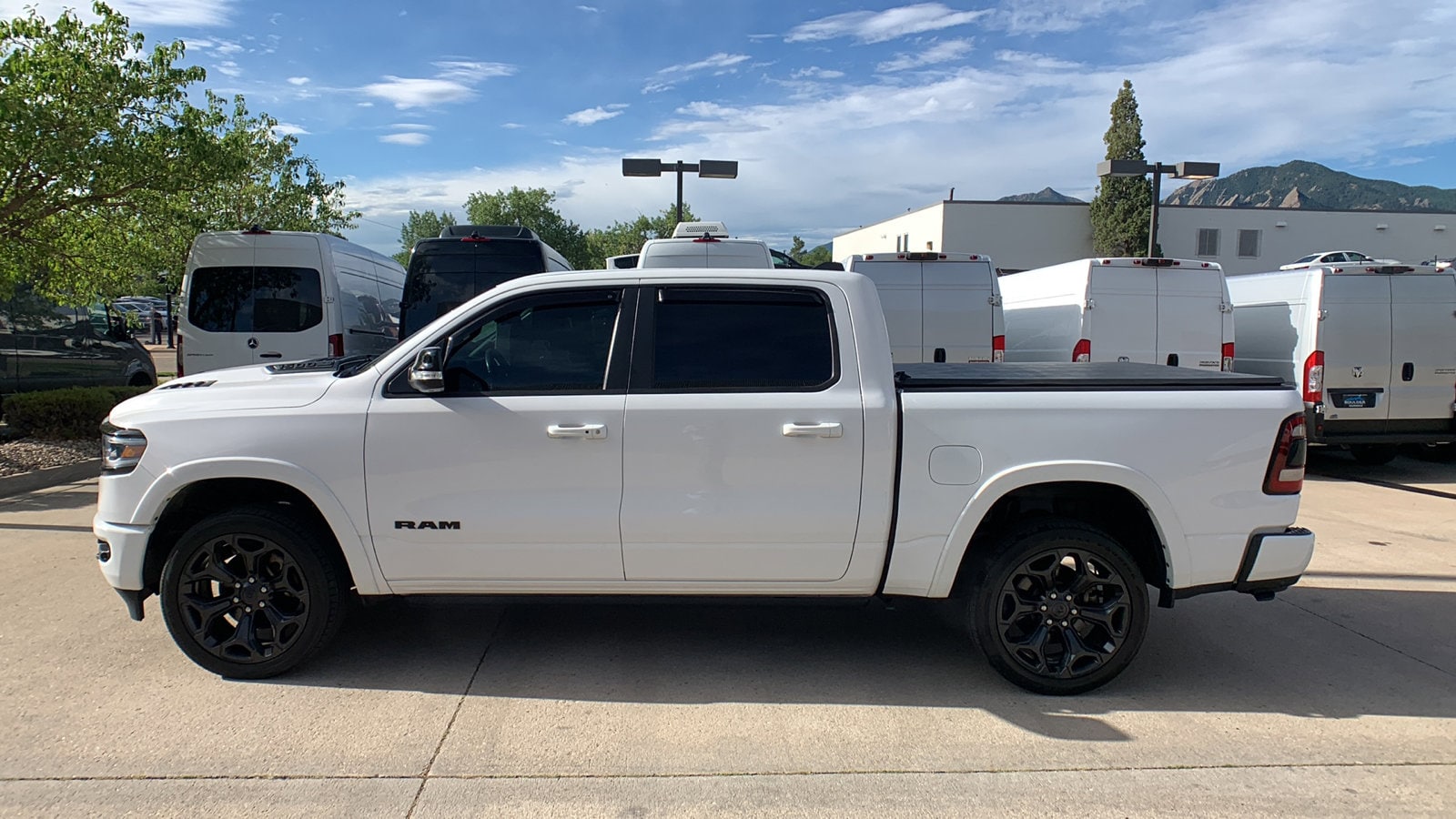 Used 2021 RAM Ram 1500 Pickup Limited with VIN 1C6SRFHT4MN683174 for sale in Boulder, CO