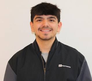 Staff member Ryan Dominguez from 3361bd97bccd