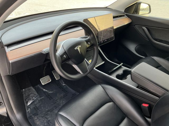 Used 2021 Tesla Model Y Long Range with VIN 5YJYGDEE2MF084288 for sale in Fargo, ND