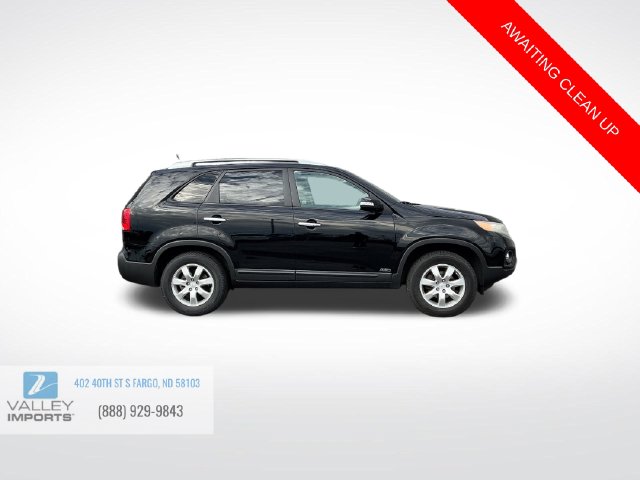 Used 2011 Kia Sorento LX with VIN 5XYKTCA19BG057559 for sale in Fargo, ND