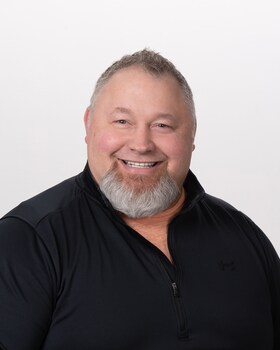 Staff member John Olson from 9be294bc7233