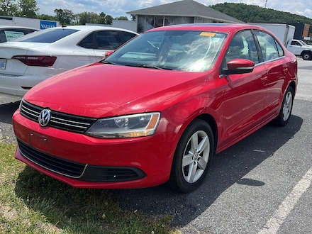 Featured used cars, trucks, and SUVs 2013 Volkswagen Jetta Sedan TDI w/Premium Sedan for sale near you in Staunton, VA