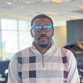 Staff member Hassan Darby from ID_f5bd95