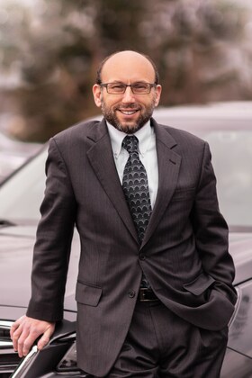 Staff member Ian Friedlander from 5e9d0f461285