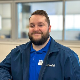 Staff member George Matthews from a6cb9bea4302