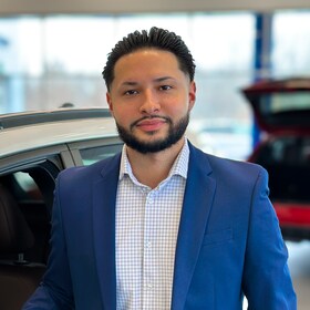 Staff member Sergio Colon from 5e9d0f461285