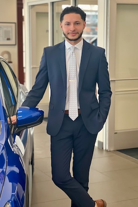 Staff member Sergio Colon from 5e9d0f461285