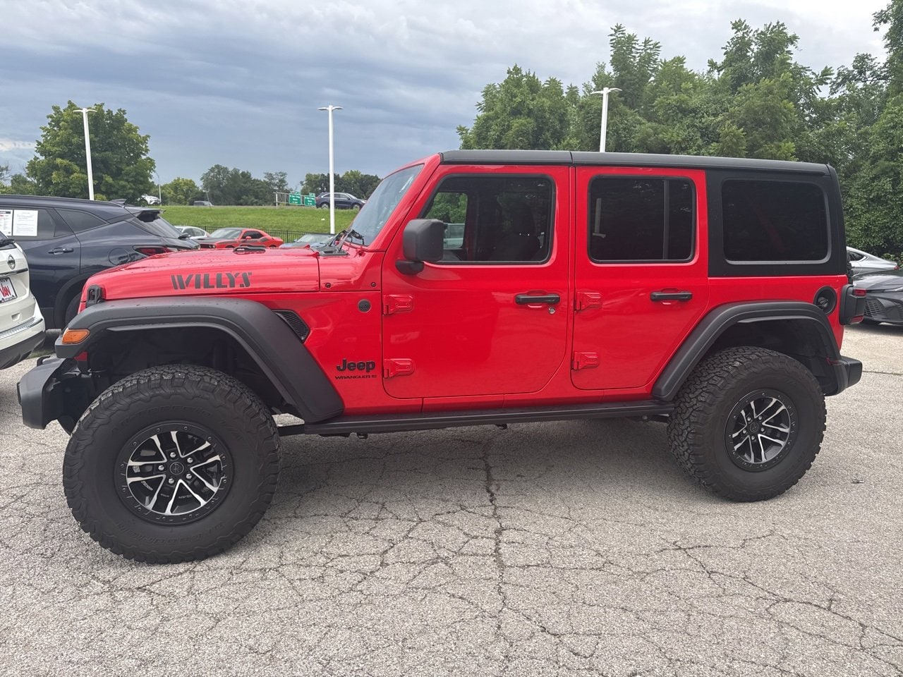 Used 2024 Jeep Wrangler 4-Door Willys with VIN 1C4RJXDGXRW258721 for sale in Kansas City