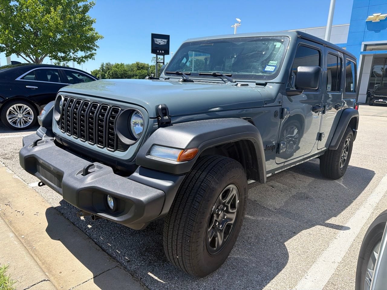 Used 2024 Jeep Wrangler 4-Door Sport with VIN 1C4PJXDG3RW346422 for sale in Kansas City