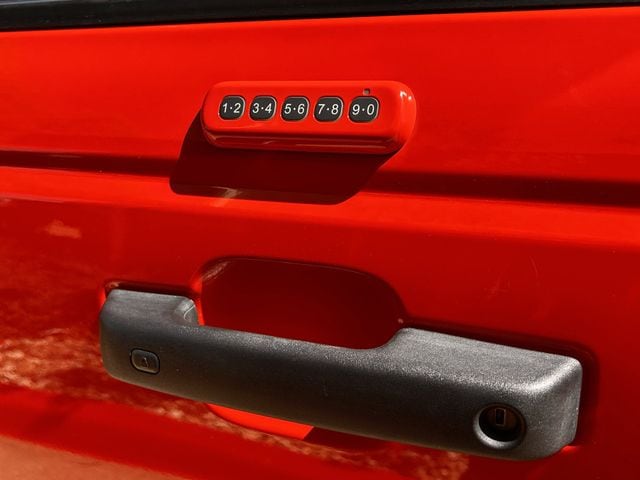 Used 2022 Orange Ford Raptor image 9