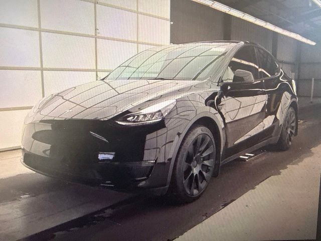 Used 2023 Tesla Model Y Long Range with VIN 7SAYGDEE9PA127318 for sale in Arlington, TX