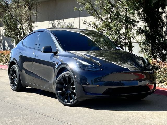 Used 2024 Tesla Model Y Long Range with VIN 7SAYGDEE7RA241109 for sale in Arlington, TX