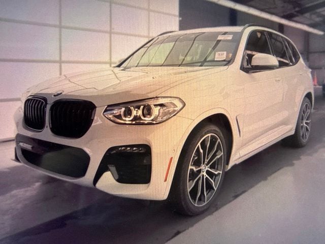 Used 2021 Alpine White BMW sDrive30i image 2