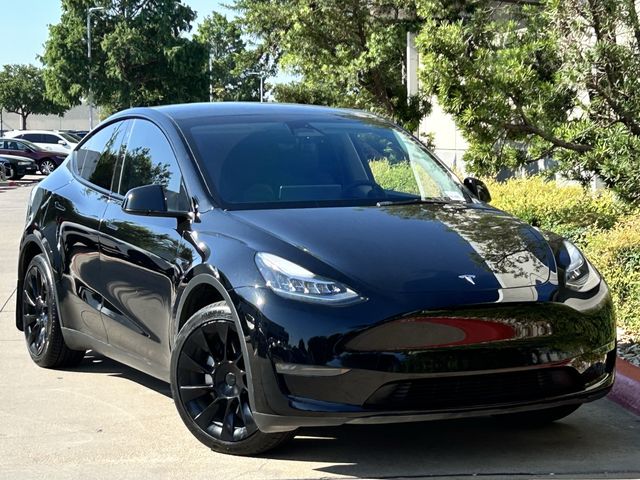 Used 2023 Tesla Model Y Long Range with VIN 7SAYGDEE9PA127318 for sale in Arlington, TX