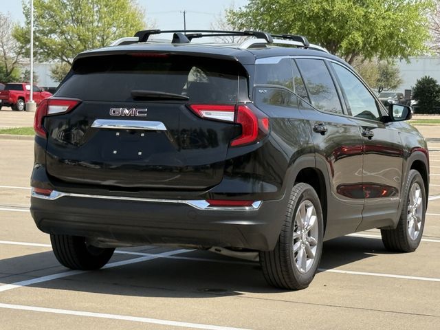 Used 2024 Ebony Twilight Metallic GMC SLT image 4