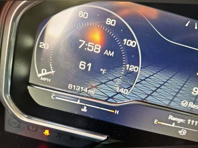 Used 2023 Volcanic Red Tintcoat GMC AT4 image 8