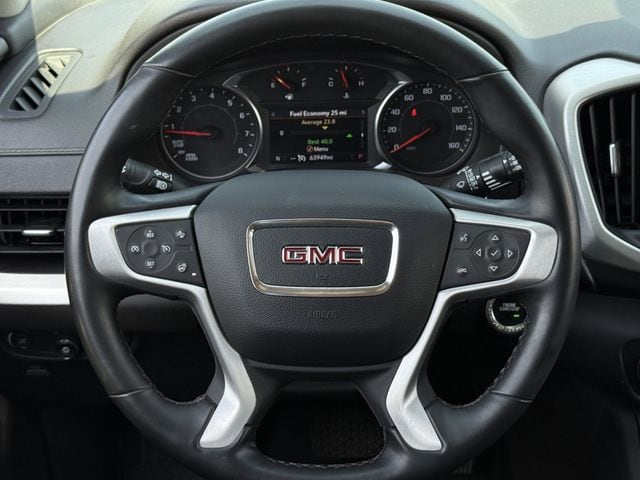Used 2024 Ebony Twilight Metallic GMC SLT image 13