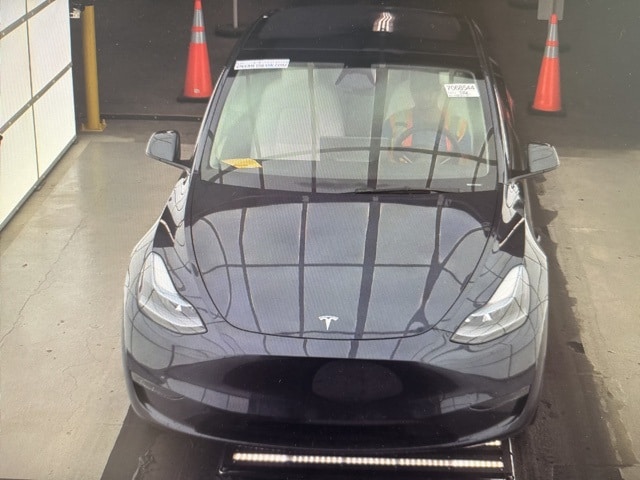 Used 2024 Tesla Model Y Long Range with VIN 7SAYGDED0RA323190 for sale in Arlington, TX