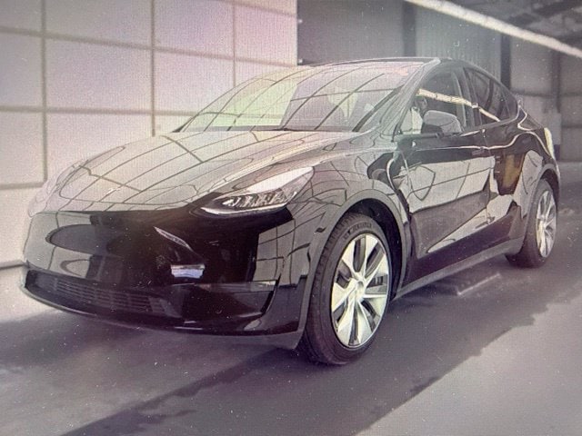 Used 2023 Tesla Model Y Long Range with VIN 7SAYGDEE5PA074102 for sale in Arlington, TX