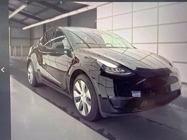 Used 2023 Tesla Model Y Long Range with VIN 7SAYGDEE5PA074102 for sale in Arlington, TX