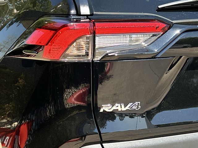 Used 2025 Midnight Black Metallic Toyota LE image 7