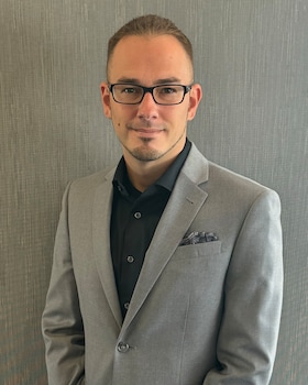 Staff member Cody Miller from ID_a0a29a25b27c