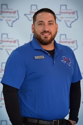 Staff member Carlos Lewis from ID_a0a29a25b27c