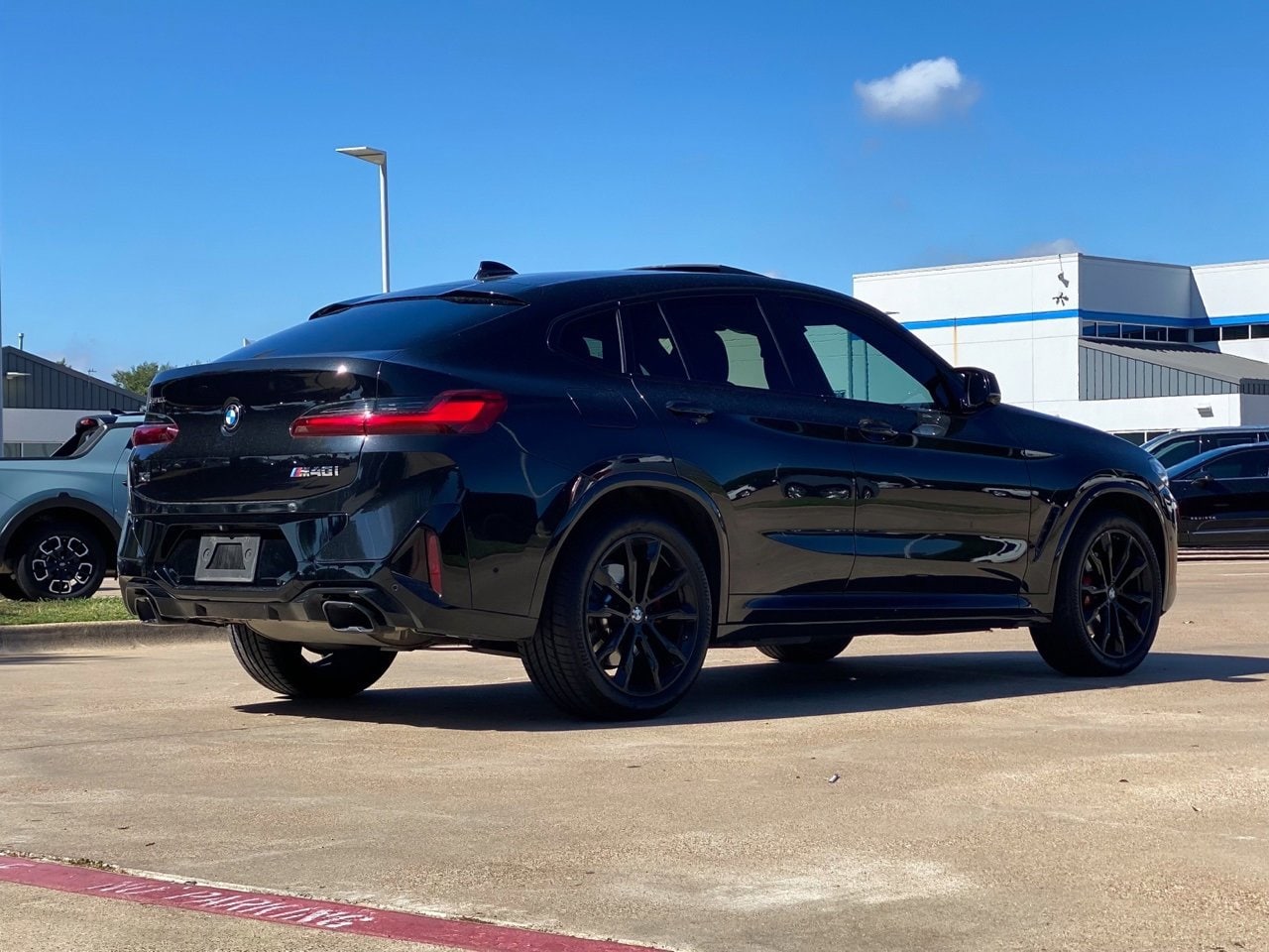 Used 2022 BMW X4 M40i with VIN 5UX43DT09N9L75317 for sale in Arlington, TX