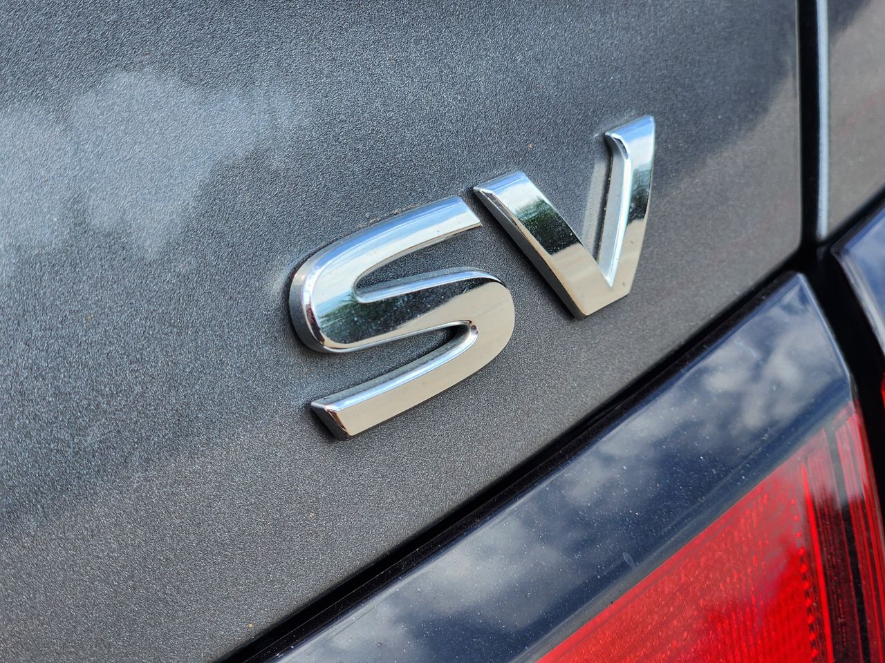 Used 2024 Gun Metallic Nissan 1.6 SV image 8