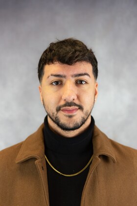 Staff member Moe Zidane from ID_9321f1eeccc8