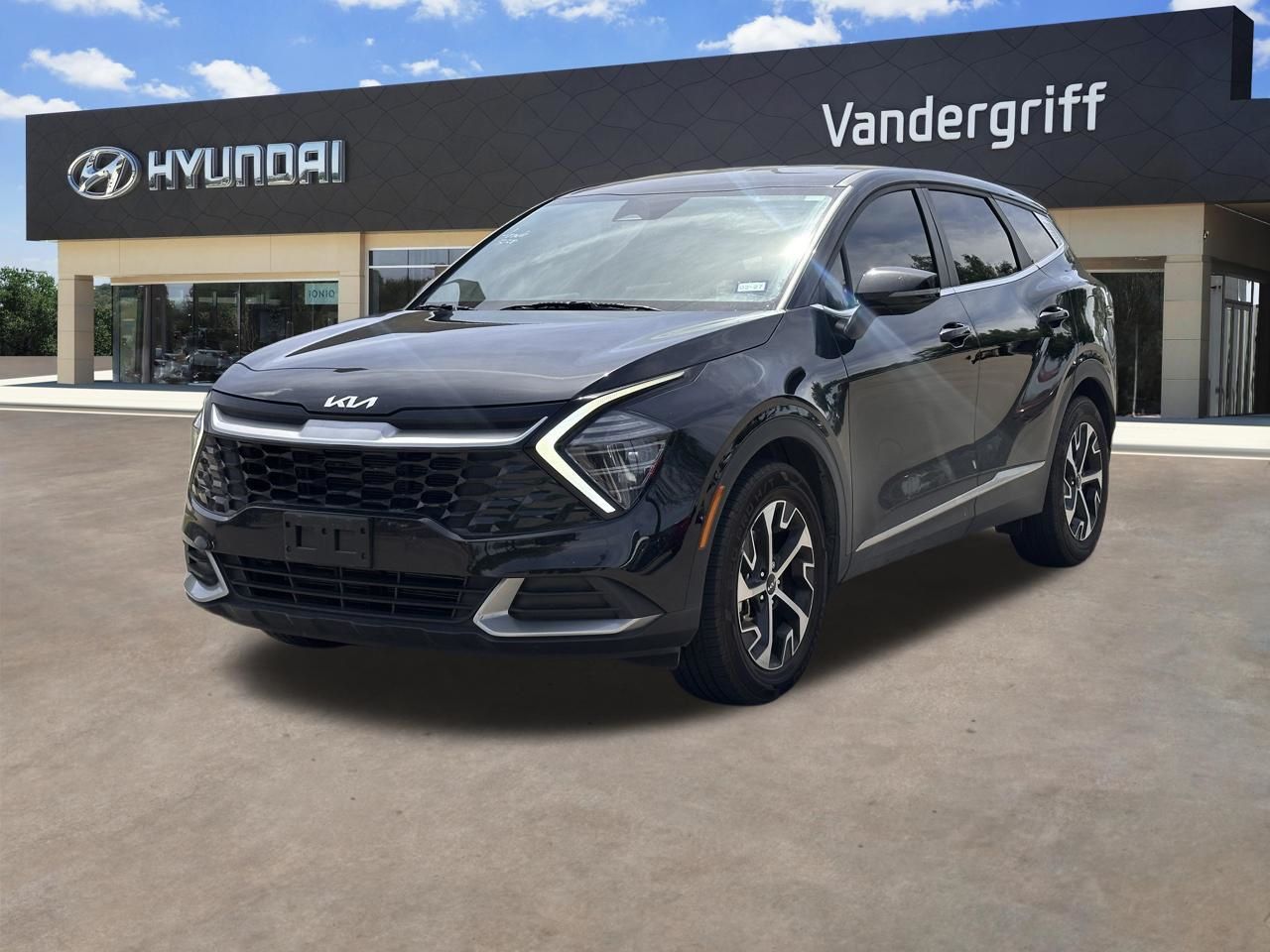 Used 2025 Ebony Black Kia EX image 2