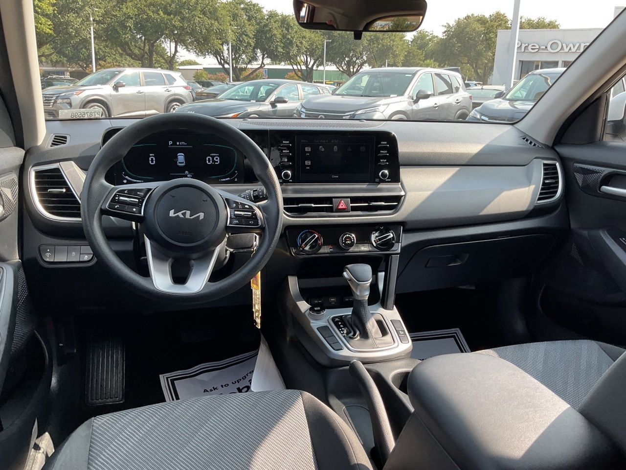 Used 2026 Clear White Black Roof Kia LX image 25