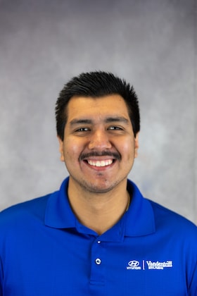 Staff member Alec Guerrero from ID_51497c3fbb21