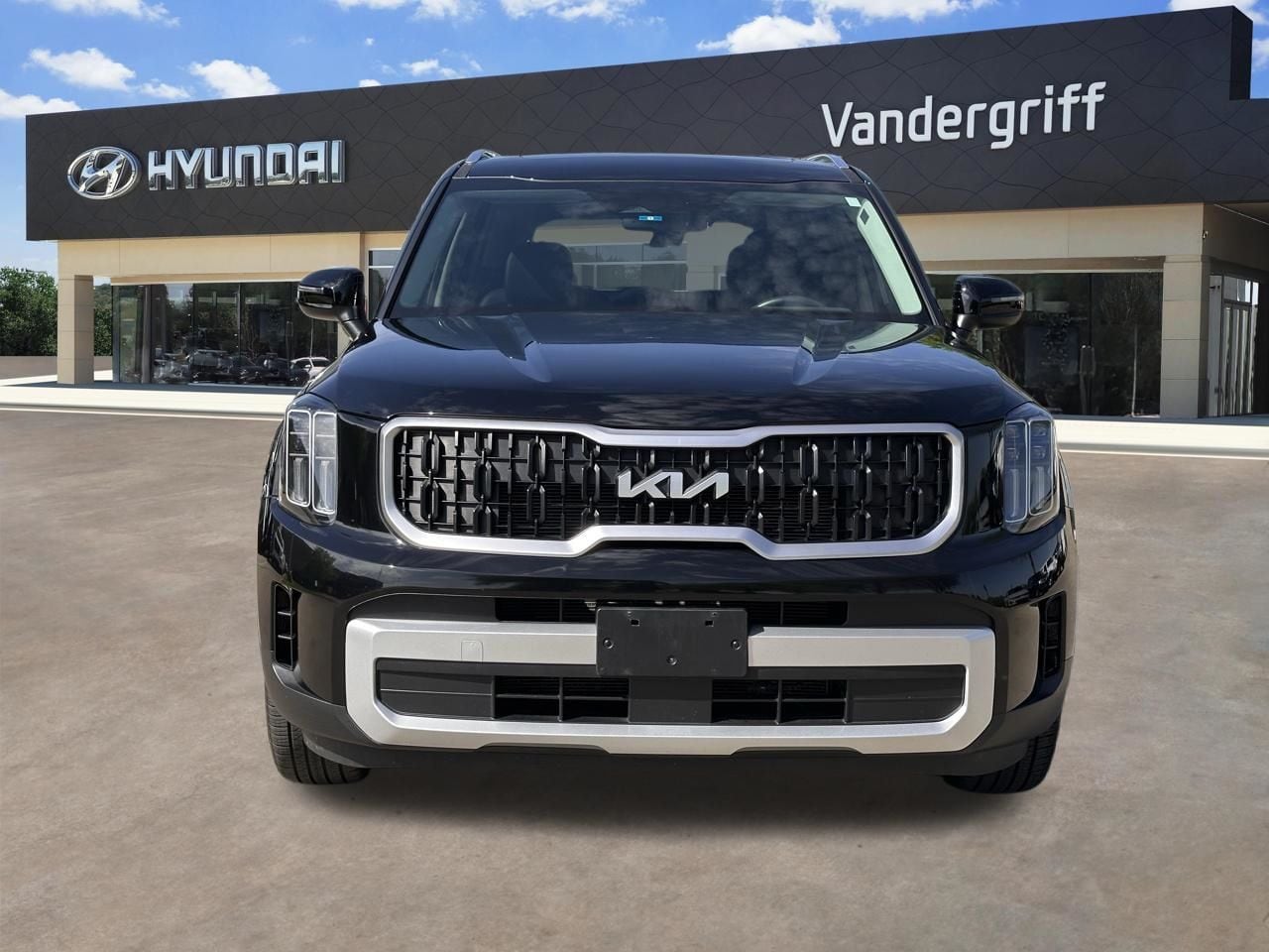 Used 2025 Ebony Black Kia EX image 5