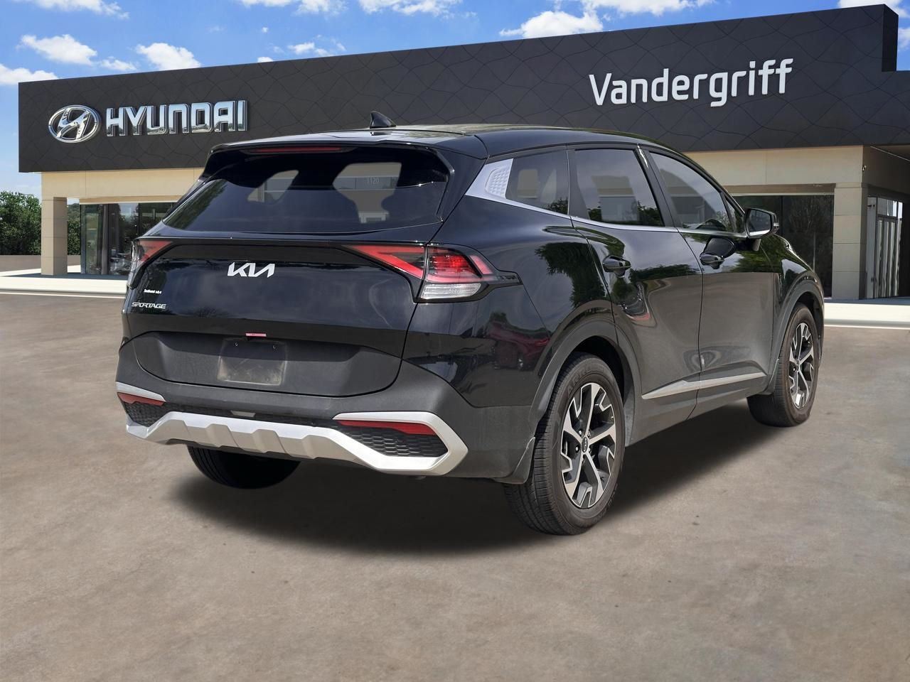 Used 2025 Ebony Black Kia EX image 12