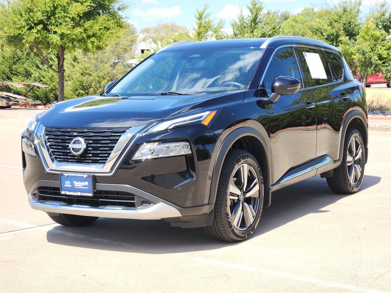 Used 2023 Super Black Nissan Platinum image 2