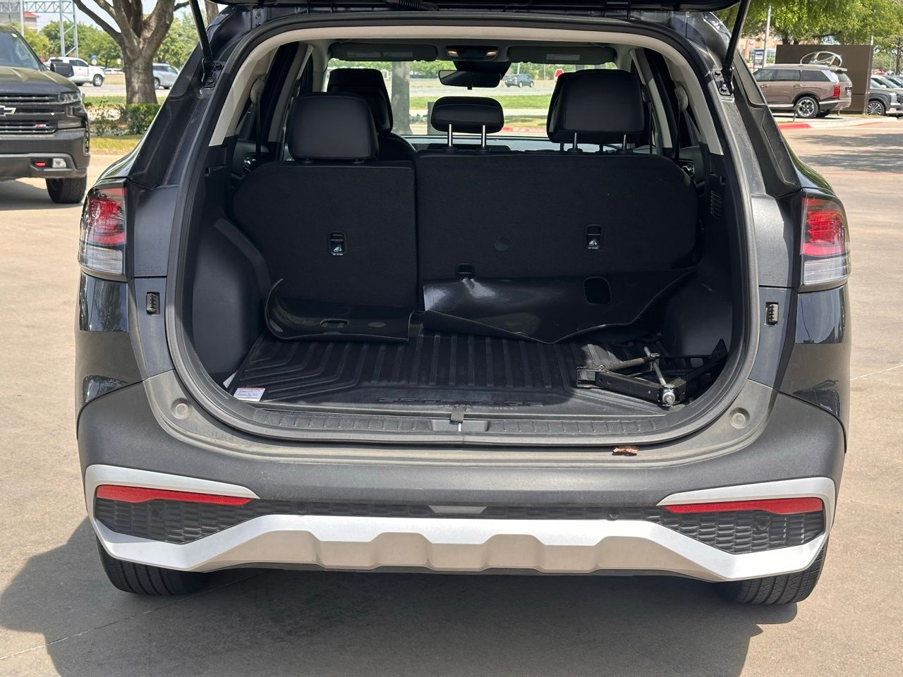 Used 2025 Ebony Black Kia EX image 11