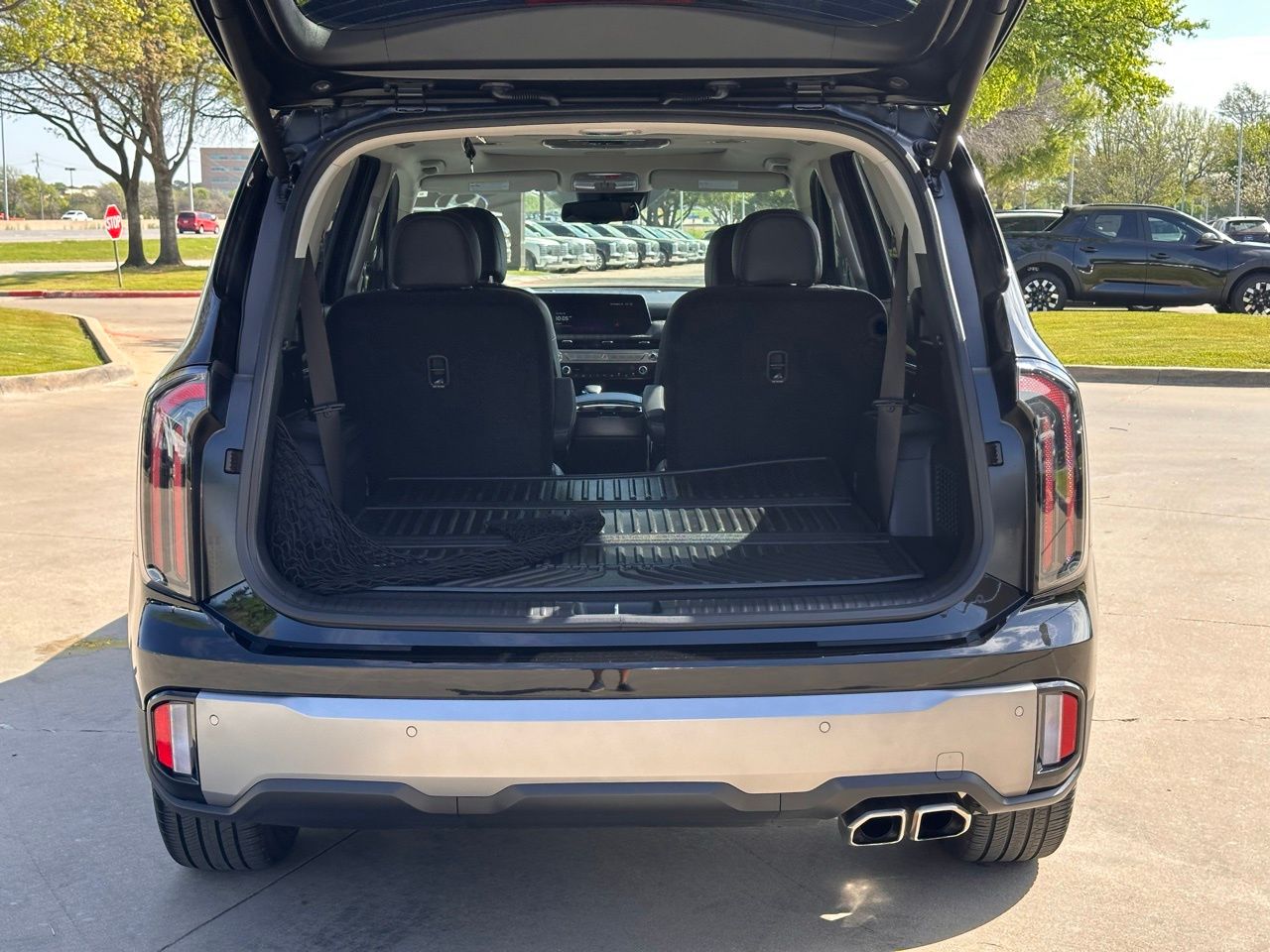 Used 2025 Ebony Black Kia EX image 15