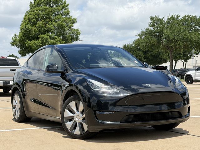Used 2023 Tesla Model Y Long Range with VIN 7SAYGDEEXPA036977 for sale in Arlington, TX