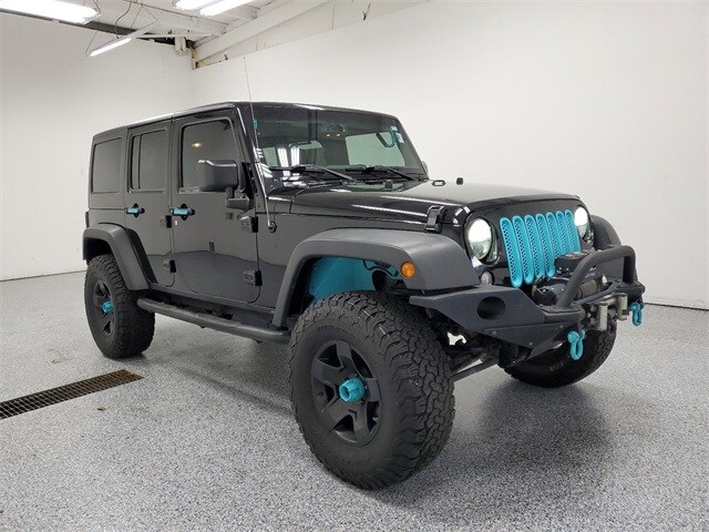 Used 2016 Jeep Wrangler Unlimited Sport S with VIN 1C4BJWDG0GL114640 for sale in Cedar Springs, MI