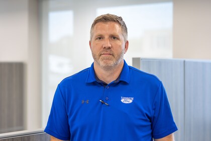 Staff member Mike Lee from ID_679986e74e64