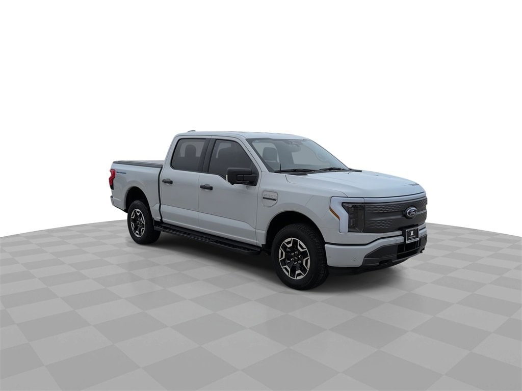 Used 2023 Ford F-150 Lightning XLT with VIN 1FTVW1ELXPWG34131 for sale in Carrollton, TX