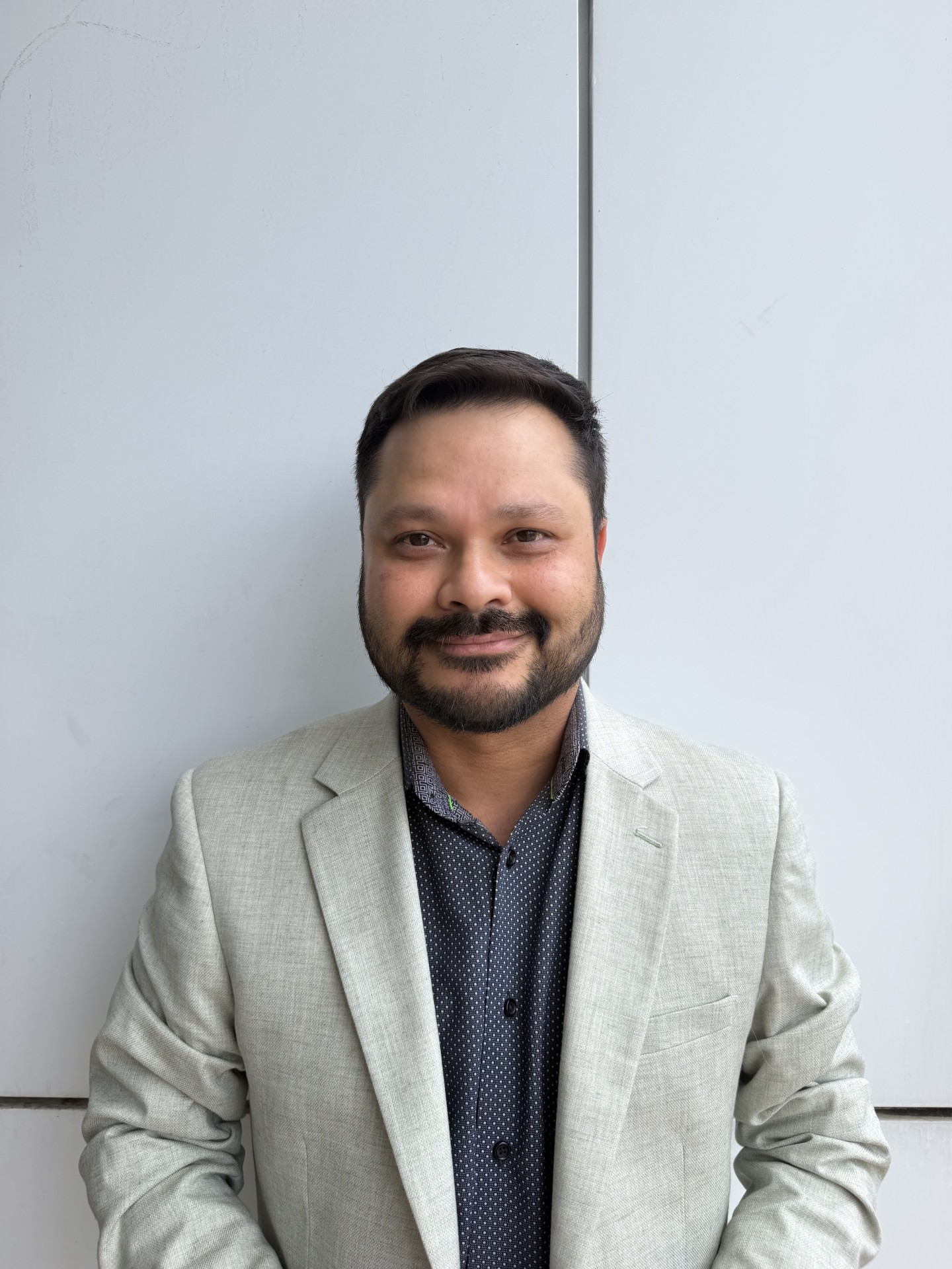 Staff member Shawn Hossain from ID_fec931