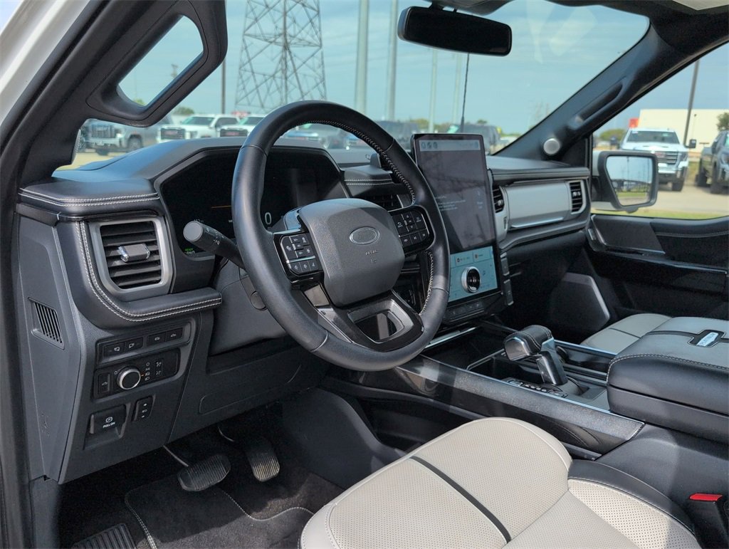 Used 2022 Ford F-150 Lightning Platinum with VIN 1FT6W1EV7NWG05026 for sale in Carrollton, TX