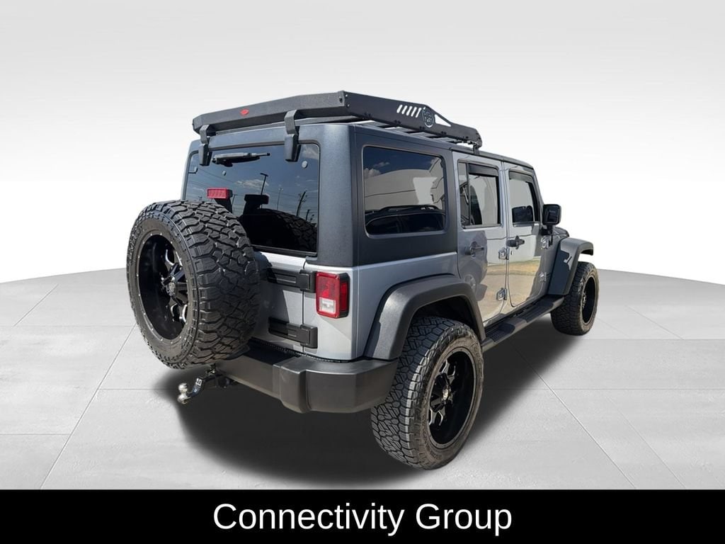 Used 2014 Jeep Wrangler Unlimited Sport SUV